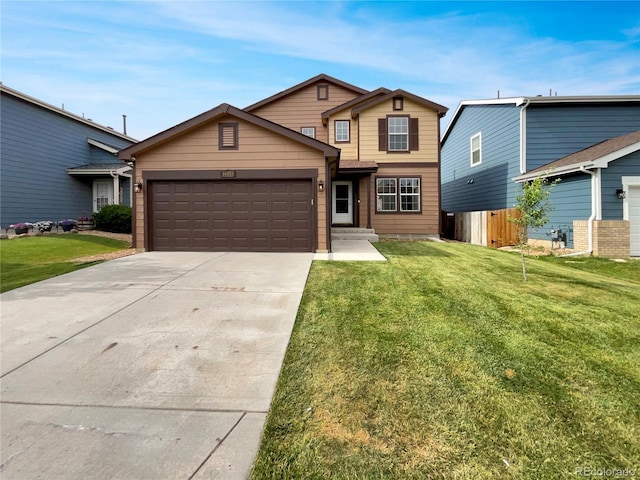 16453 E Phillips Dr, Englewood, CO 80112 - traditional home with an attached garage, a front yard, and driveway