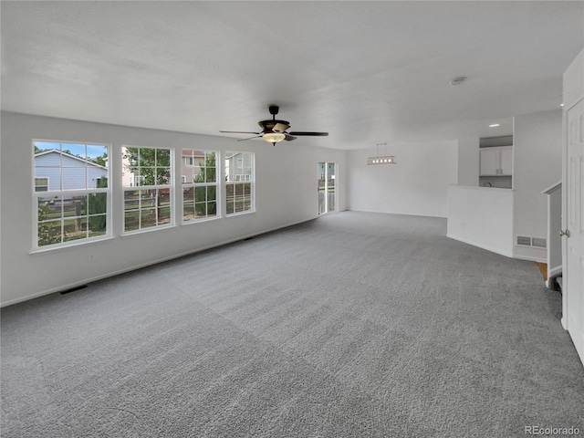 16453 E Phillips Dr, Englewood, CO 80112 - unfurnished living room with carpet and ceiling fan