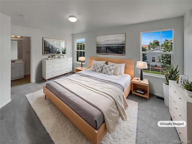 16453 E Phillips Dr, Englewood, CO 80112 - bedroom with multiple windows and light colored carpet
