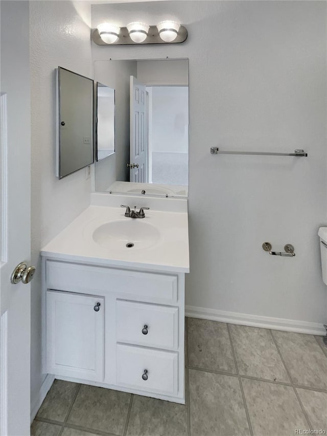 16453 E Phillips Dr, Englewood, CO 80112 - bathroom with vanity and tile patterned flooring