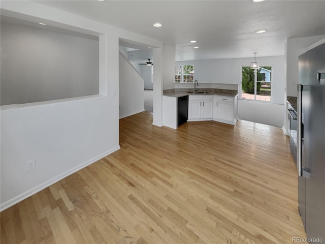 16453 E Phillips Dr, Englewood, CO 80112 - kitchen featuring white cabinetry, dishwasher, light wood finished floors, recessed lighting, and stainless steel fridge