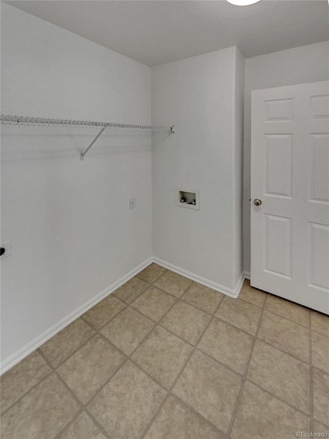 16453 E Phillips Dr, Englewood, CO 80112 - washroom with hookup for a washing machine, electric dryer hookup, and light tile patterned floors