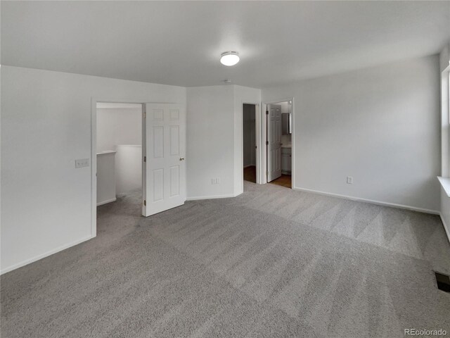 16453 E Phillips Dr, Englewood, CO 80112 - unfurnished bedroom with carpet floors and a spacious closet