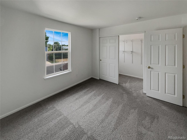 16453 E Phillips Dr, Englewood, CO 80112 - unfurnished bedroom featuring carpet floors and a closet