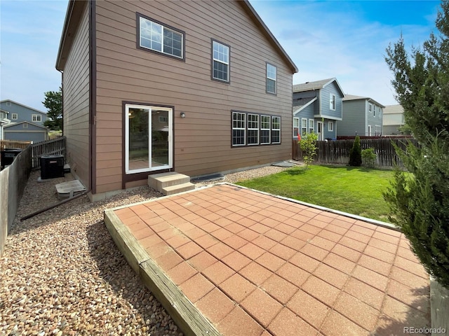 16453 E Phillips Dr, Englewood, CO 80112 - back of house featuring a patio, a fenced backyard, and a residential view