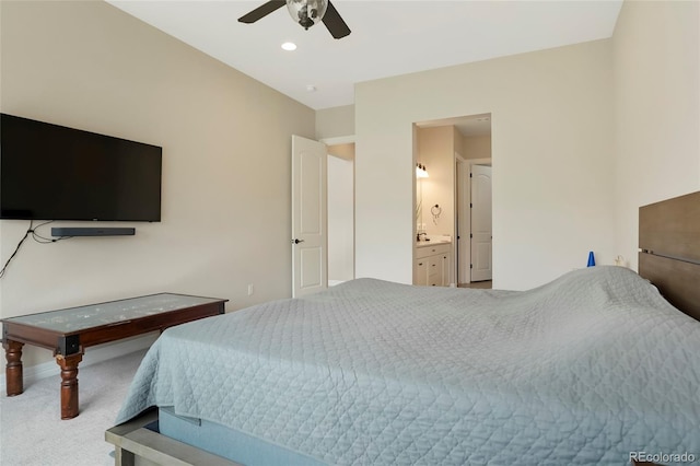 carpeted bedroom with ensuite bath, a ceiling fan, and recessed lighting