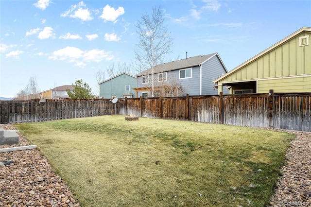 view of yard featuring a fenced backyard