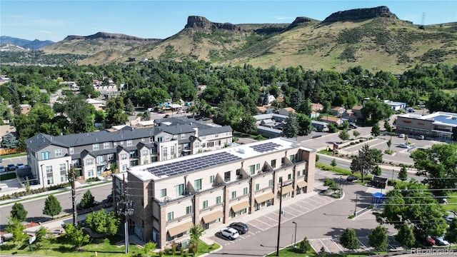 drone / aerial view featuring a mountain view