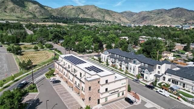 drone / aerial view featuring a mountain view