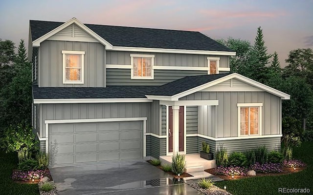 view of front of house featuring board and batten siding, driveway, and roof with shingles