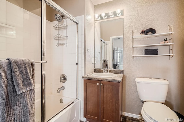 full bathroom with vanity, toilet, and enclosed tub / shower combo