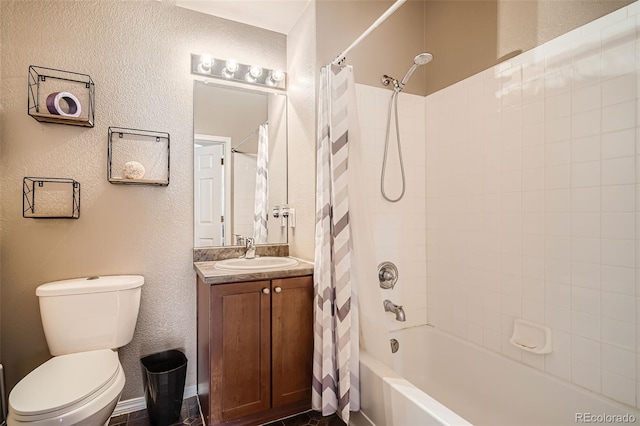 full bathroom featuring vanity, shower / tub combo, and toilet