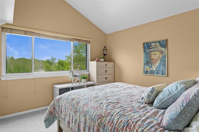 bedroom featuring carpet, lofted ceiling, and baseboards