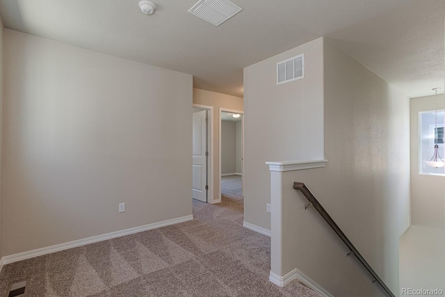 814 N Bently St, Watkins, CO 80137 - corridor with an upstairs landing, carpet flooring, and baseboards