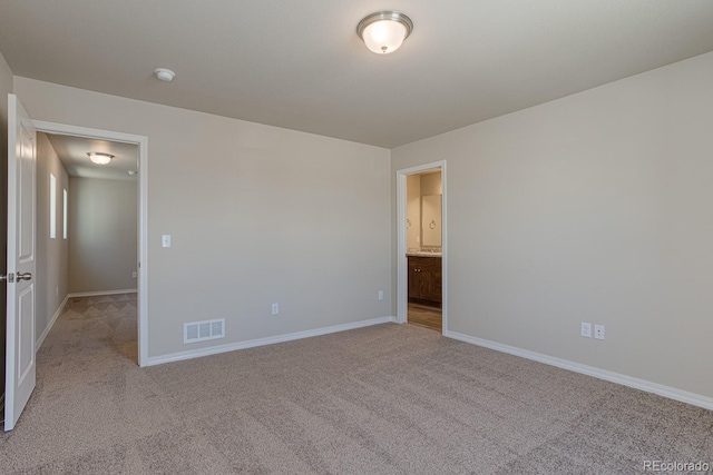 814 N Bently St, Watkins, CO 80137 - unfurnished room with carpet flooring, baseboards, and a smoke detector