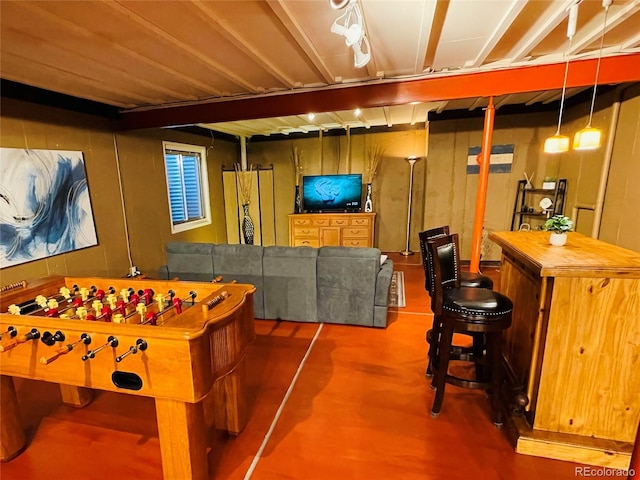 game room with wood finished floors