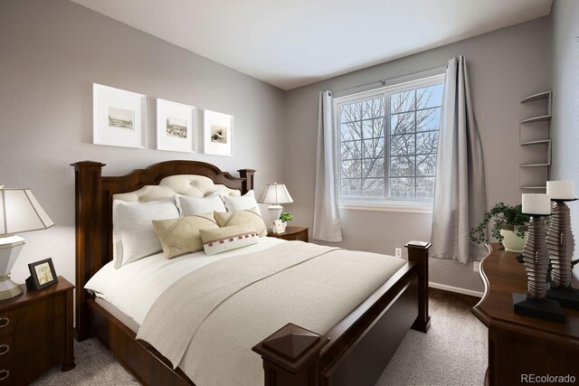 carpeted bedroom featuring baseboards