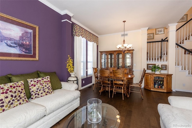 living area with visible vents, crown molding, stairway, and wood finished floors