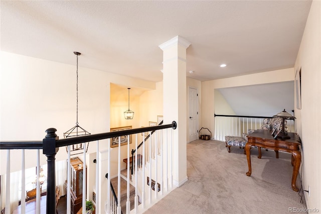 corridor with carpet, an upstairs landing, and recessed lighting