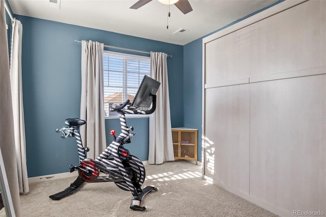 exercise room featuring carpet floors and ceiling fan