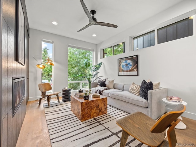3715 Kalamath St, Denver, CO 80211 - living area with light wood-style floors, ceiling fan, recessed lighting, and baseboards