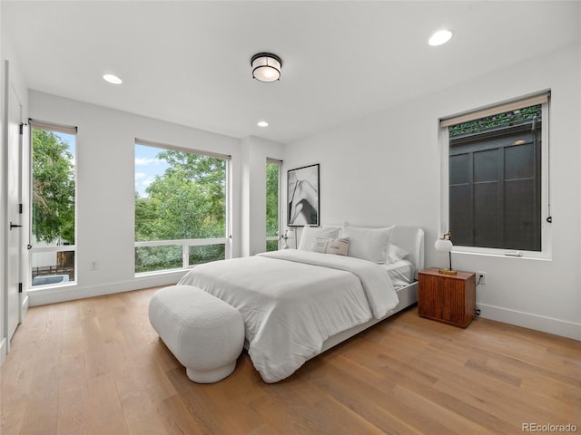 3715 Kalamath St, Denver, CO 80211 - bedroom with baseboards, light wood-style flooring, and recessed lighting