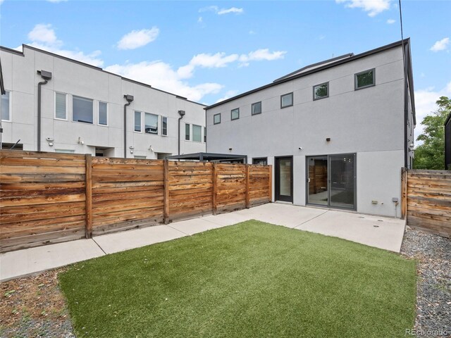 3715 Kalamath St, Denver, CO 80211 - back of house featuring stucco siding and a patio area