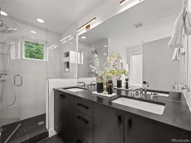 3715 Kalamath St, Denver, CO 80211 - full bath with a shower stall, double vanity, and recessed lighting