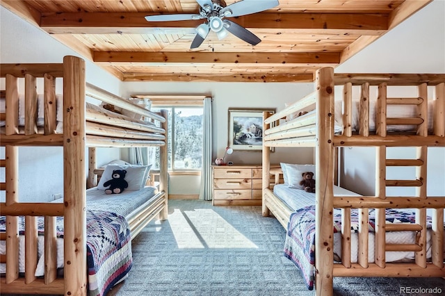 9659 S Turkey Creek Rd, Morrison, CO 80465 - bedroom with wooden ceiling with exposed beams and carpet floors