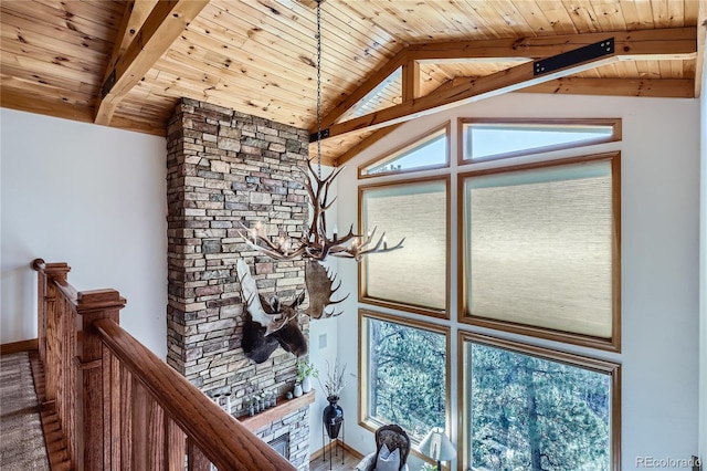 9659 S Turkey Creek Rd, Morrison, CO 80465 - detailed view of wooden ceiling with exposed beams, a chandelier, and baseboards