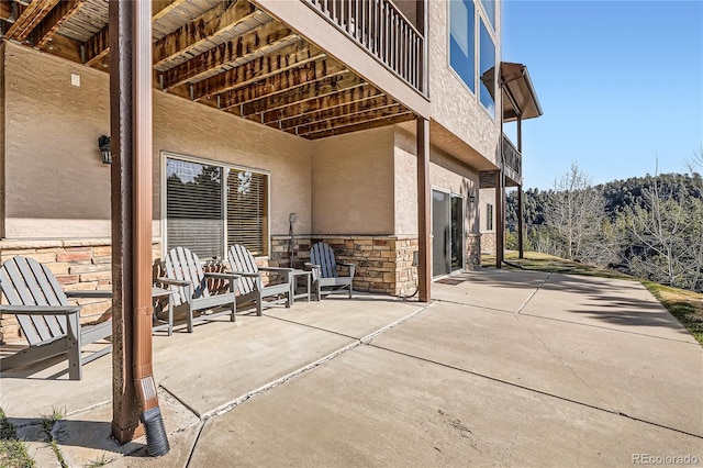 9659 S Turkey Creek Rd, Morrison, CO 80465 - view of patio with a balcony