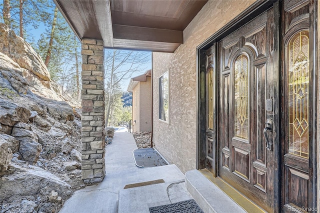 9659 S Turkey Creek Rd, Morrison, CO 80465 - view of exterior entry with stucco siding