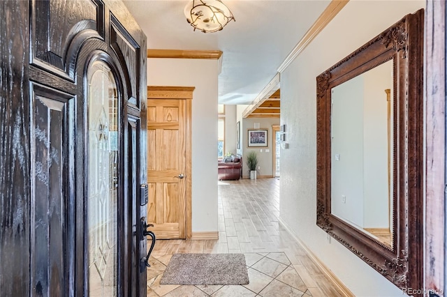 9659 S Turkey Creek Rd, Morrison, CO 80465 - entryway with ornamental molding, baseboards, and light tile patterned floors