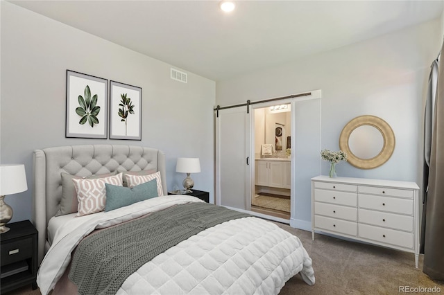 254 Gila Trl, Ault, CO 80610 - bedroom featuring a barn door, carpet, and ensuite bath