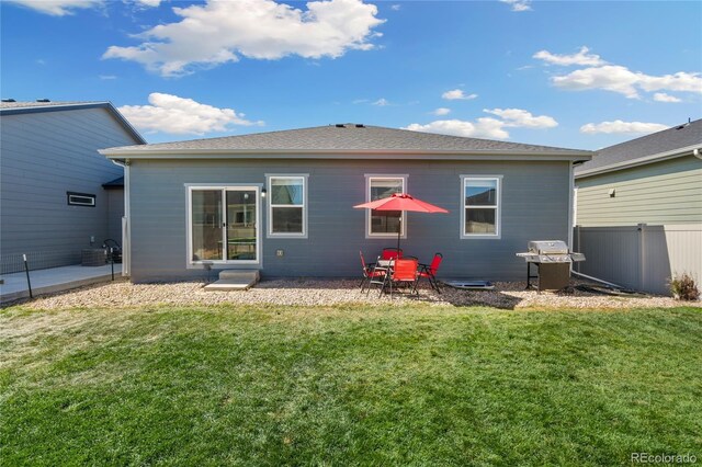 254 Gila Trl, Ault, CO 80610 - rear view of house featuring a patio area and cooling unit