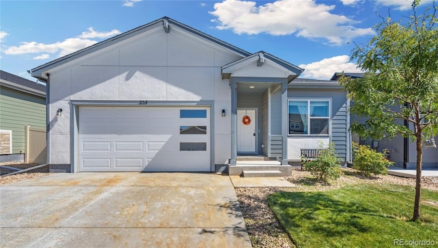 254 Gila Trl, Ault, CO 80610 - ranch-style house featuring concrete driveway and a garage