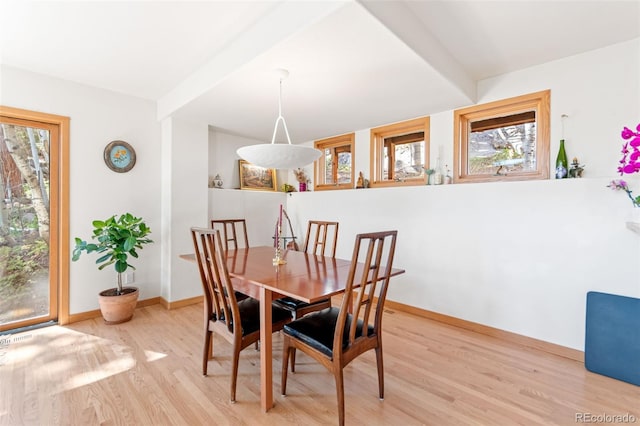 597 Pine Glade Rd, Nederland, CO 80466 - dining area featuring wood finished floors and baseboards
