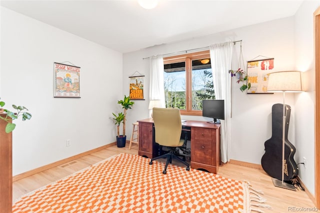 597 Pine Glade Rd, Nederland, CO 80466 - office featuring wood finished floors and baseboards
