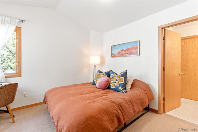 597 Pine Glade Rd, Nederland, CO 80466 - bedroom with carpet, vaulted ceiling, and baseboards