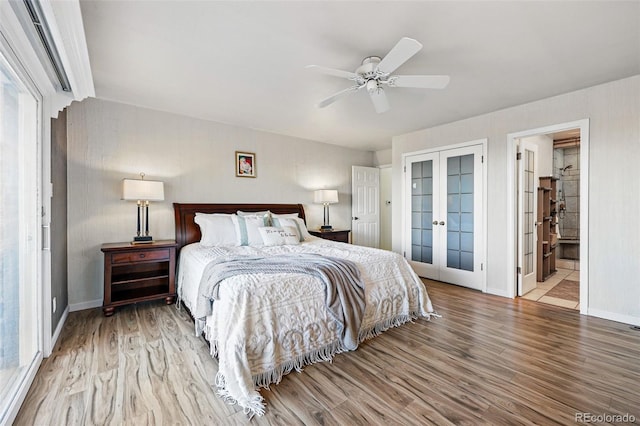 8090 Newton St, Westminster, CO 80031 - bedroom featuring french doors, wood finished floors, baseboards, and ceiling fan