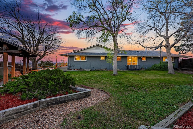8090 Newton St, Westminster, CO 80031 - back of house with a yard and brick siding