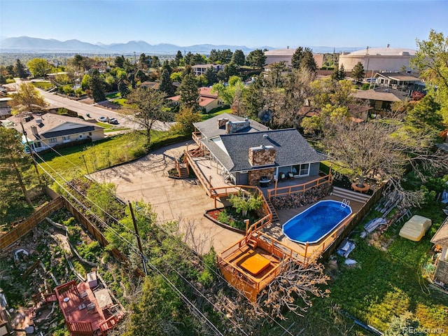 8090 Newton St, Westminster, CO 80031 - view from above of property featuring a pool and a mountainous background