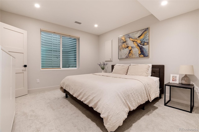 4711 S Logan St, Englewood, CO 80113 - bedroom with light carpet, recessed lighting, and baseboards