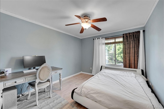 bedroom with light wood-type flooring, crown molding, and ceiling fan