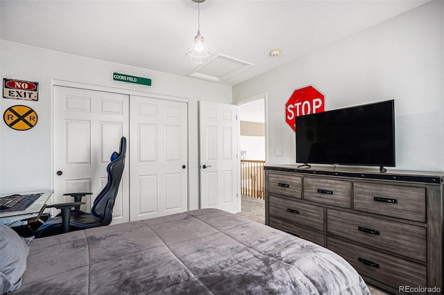 carpeted bedroom with a closet