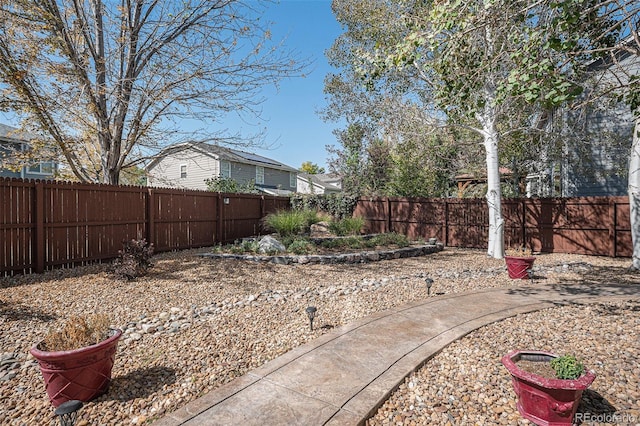 view of yard featuring a fenced backyard