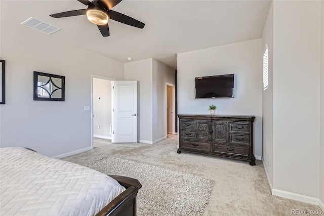 bedroom with visible vents, carpet flooring, baseboards, and ceiling fan