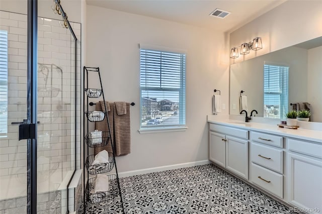 full bathroom featuring a wealth of natural light, visible vents, and a stall shower