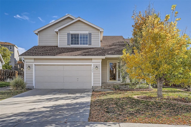 view of front of property with a garage