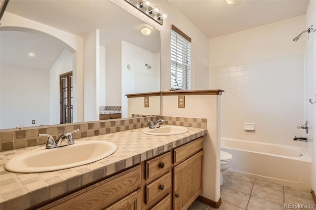 full bathroom featuring vanity, shower / bathing tub combination, toilet, and tile patterned floors